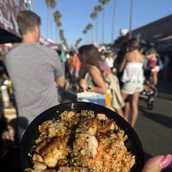 Rice bowl with chicken, steak, crab and musubi