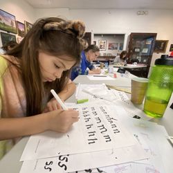 Daughter learning calligraphy!
