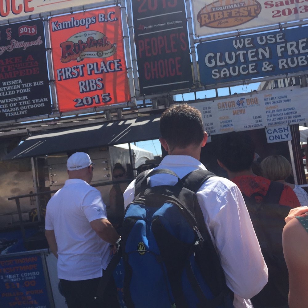 Gator Bbq - a group of people at a food stand - Food Stands Near Me - Calgary, Alberta Gator Bbq - a group of people at a food stand - Food Stands Near Me - Calgary, Alberta