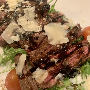 A Modo Mio - The Tagliata di Manzo was cooked perfectly (we ordered medium), and the Parmesan, arugula, and balsamic stuck a great balance. - Pizza Near Me - Arlington, Virginia