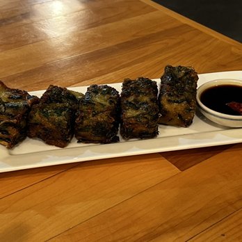 Saab Sis Thai - A10. Chive Pancakes were very fresh land savory plus the sauce was delicious. I could have eaten them all by myself! - Thai Near Me - Royal Oak, Michigan Saab Sis Thai - A10. Chive Pancakes were very fresh land savory plus the sauce was delicious. I could have eaten them all by myself! - Thai Near Me - Royal Oak, Michigan