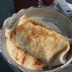 El Comal - Burrito Texano has steak chicken beef bacon shrimp and fajita vegetables inside.