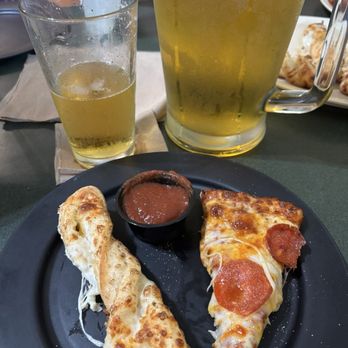 Round Table Pizza - Stella draft beer and pepperoni and garlic twist - Pizza Near Me - Santa Ana, California Round Table Pizza - Stella draft beer and pepperoni and garlic twist - Pizza Near Me - Santa Ana, California