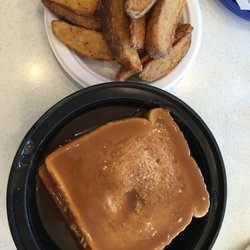 Mary Brown's Famous Chicken & Taters - Hot chicken sandwich with taters