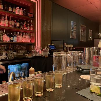 929 - a bar with a lot of glasses on the counter - Cocktail Bars Near Me - New York, New York