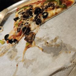 My Mother's Restaurant - Remains of the day; 12" thin crist, black olive, green papper, mushroom pizza.