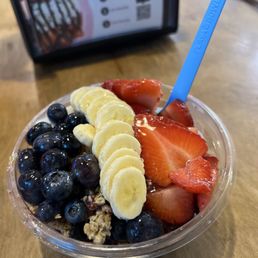 Pura Vida Acai Bowl with half coconut base plus bananas Pura Vida Acai Bowl with half coconut base plus bananas