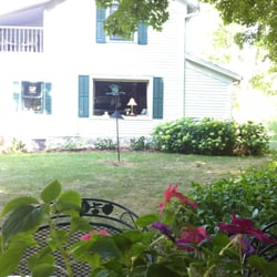 Crystal River Bed & Breakfast - The main house. View of living room window and private balcony from one of the upstairs guest rooms
