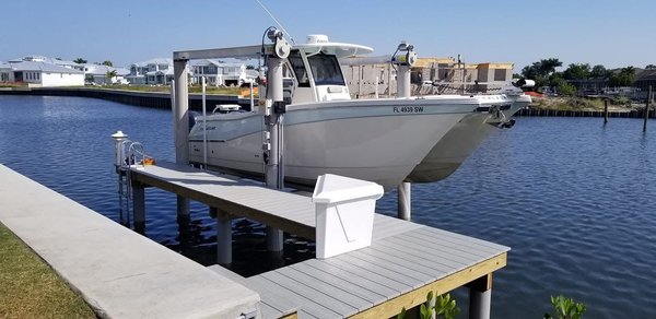 Boat Lifts - A boat lift is more than convenience — it’s protection for your investment. We install lifts that keep your boat safe from marine growth, wake damage, and daily wear, all while making launching and docking effortless. Every lift is matched to your vessel, your dock, and your waterfront conditions, ensuring smooth operation and long‑term reliability. With 47 years of marine construction experience, our crew delivers clean installs, precise alignment, and lifts built to perform season after season.