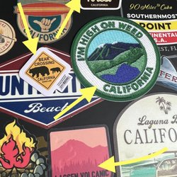 Shasta Lake Business Owners Association - Four of the stickers I bought at the welcome center