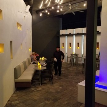 Byblos - Chic terrace with contemporary seating options for dining or just having a drink - Mediterranean Near Me - Tampa, Florida