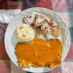 Tonalli - Milanesa de pollo napolitana (breaded chicken breast topped with a slice of ham, melted cheese and chipotle sauce - not spicy)