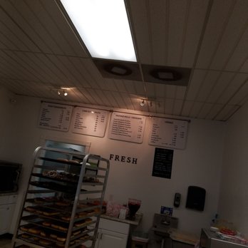 Fresh Donuts - a display of fresh donuts in a bakery - Donuts Near Me - Oklahoma City, Oklahoma Fresh Donuts - a display of fresh donuts in a bakery - Donuts Near Me - Oklahoma City, Oklahoma