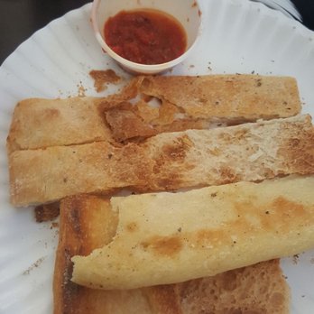 Romas Pizza - Does this look like garlic cheese bread? I don't think stale pizza crust and a cup of mystery red stuff counts. - Pizza Near Me - Augusta, Georgia Romas Pizza - Does this look like garlic cheese bread? I don't think stale pizza crust and a cup of mystery red stuff counts. - Pizza Near Me - Augusta, Georgia