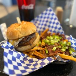 Schmidty's Burgers - Hangover Burger with bacon $ cheese fries.