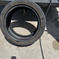 Carlos Tire Shop - Popped tire.