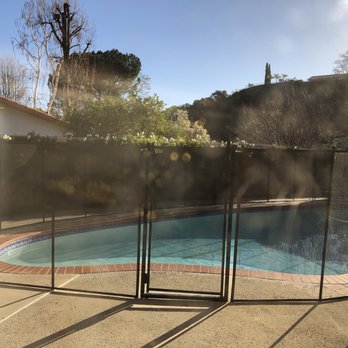 Pool Guard - a pool with a fence surrounding it - General Contractors Near Me - Thousand Oaks, California Pool Guard - a pool with a fence surrounding it - General Contractors Near Me - Thousand Oaks, California
