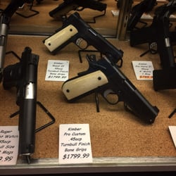 East County Guns - Kimber 1911s with Turnbull finish and bone grips.