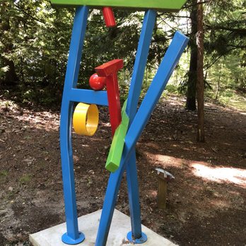 Art Rapids! - Blue Sculpture with Yellow Rings, at the entrance - Community Service/Non-Profit Near Me