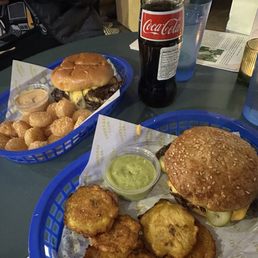 Double smash burger with tots, single smash burger on a gluten free bun with fried plantains Double smash burger with tots, single smash burger on a gluten free bun with fried plantains