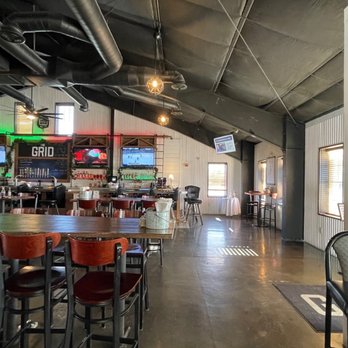 The Grid - Bar and some sitting area. There is a pool table just to the left of the tables. - Pubs Near Me - Fallon, Nevada The Grid - Bar and some sitting area. There is a pool table just to the left of the tables. - Pubs Near Me - Fallon, Nevada