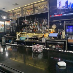 bar counter with a bowl of candy