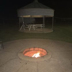 The Barn At Double K Ranch - Good fireplace with a half grain bin behind with bleachers and games for the kids