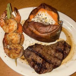Texas Roadhouse - 6oz Sirloin* & Grilled Shrimp, baked Sweet Potato with butter