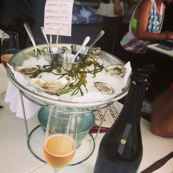 Fishing With Dynamite - 1/2 dozen Oyster sampler with brut rose sparkling wine to start - Seafood Near Me - Manhattan Beach, California