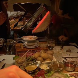 a person preparing food at a restaurant a person preparing food at a restaurant