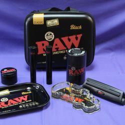 Ballantyne Tobacco & Vape smoke shop - RAW travel kit, that comes with a tray, grinder, airtight holder, ashtray, rolling tool, and roll holders