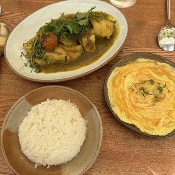 Tanzie's - Cod fish curry with lava eggs - Salad Near Me - Berkeley, California Tanzie's - Cod fish curry with lava eggs - Salad Near Me - Berkeley, California