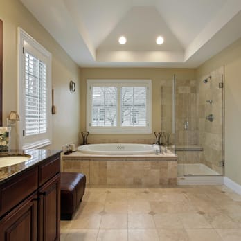 Kitchen and Bath Wizards - Bathroom Remodel in Houston, TX with glass shower and new bathtub - Countertop Installation Near Me