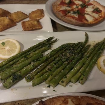 Visconti's Ristorante - Margarita pizza in background - Italian Near Me - Folsom, California Visconti's Ristorante - Margarita pizza in background - Italian Near Me - Folsom, California