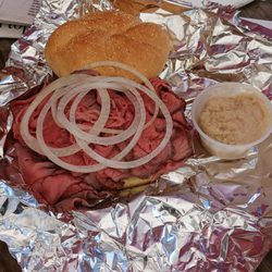 Charcoal Style - Rare pit beef with raw onions. Horseradish in a cup.