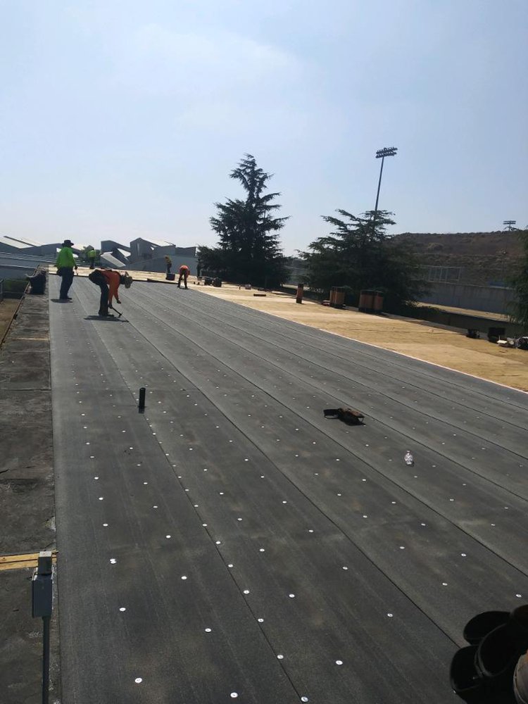 Slide of Torres Roofing