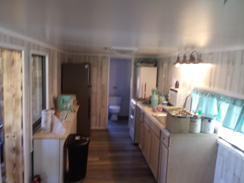 Slide of D&P  Seamless Gutters & Custom Remodeling 