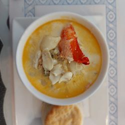 Charlene's Bayside Restaurant - Seafood chowder bowl (has fish, clams, scallops and lobster claw) with complimentary homemade biscuit
