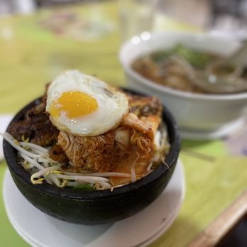 Bistro B - #550. Com Nieu Suon Bo Dai Han Burning hot stone pot. Ask for an extra plate. - Vietnamese Near Me - Dallas, Texas