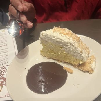 Molly Woo's Asian Bistro - Toasted Coconut Cream Pie - Chinese Near Me - Columbus, Ohio Molly Woo's Asian Bistro - Toasted Coconut Cream Pie - Chinese Near Me - Columbus, Ohio