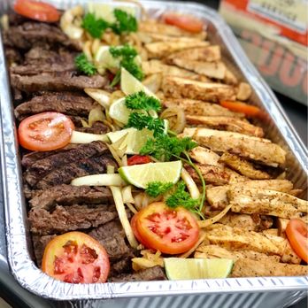 Monarca Bar & Grill - a tray of food - Mexican Near Me - Magnolia, Texas Monarca Bar & Grill - a tray of food - Mexican Near Me - Magnolia, Texas