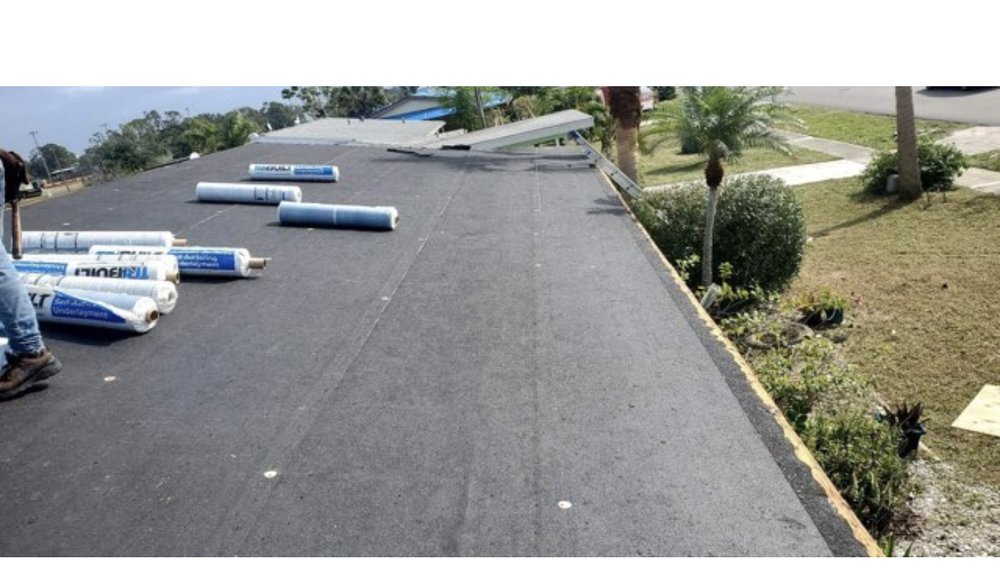 Slide of Ark Roofing and solar