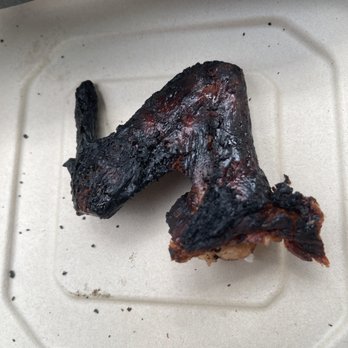 Pollo Tropical - a piece of meat on a plate - Fast Food Near Me - Miami, Florida