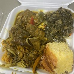 Clautas Carribean Shack - Curry chicken with yellow rice and greens