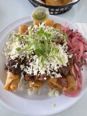 Titos Taquitos Swan Island by null