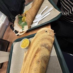 Curried chicken, onions and spinach dosas and the spiced Indian potatoes, grilled chicken and spinach dosas.