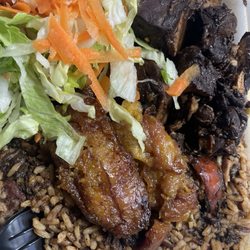 Donna's Caribbean Restaurant - Stew Chicken, Plantains, Salad, rice and peas.