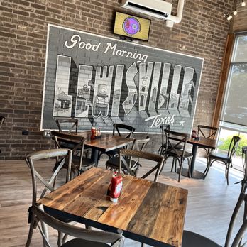 Seven Mile Cafe - tables and chairs in front of a brick wall - Breakfast & Brunch Near Me - Lewisville, Texas Seven Mile Cafe - tables and chairs in front of a brick wall - Breakfast & Brunch Near Me - Lewisville, Texas
