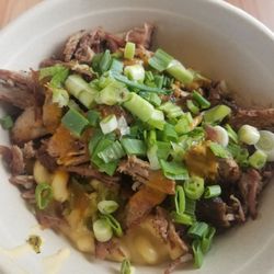 Abq Grill n Que - "Martin Special" with mac and cheese topped with pulled pork, green Chile and green onions
