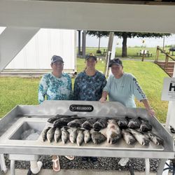 Hackberry Fishing Camp and Marina - It was a rainy day but Hayden still put us on some fish until we decided they were enough!